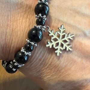 Elegant Black Beaded Bracelet with Silver Snowflake Charm